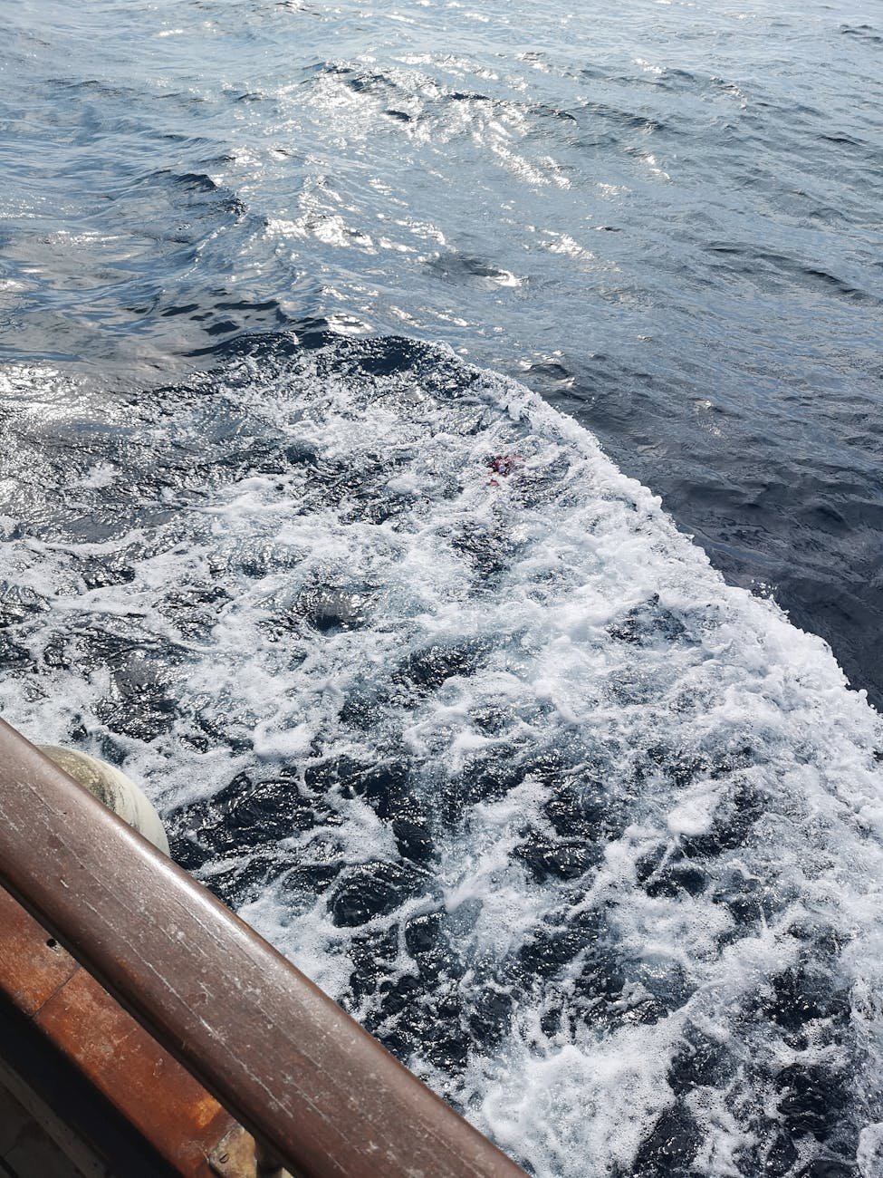 Capturing the natural beauty and motion of ocean waves splashing against a wooden pier.