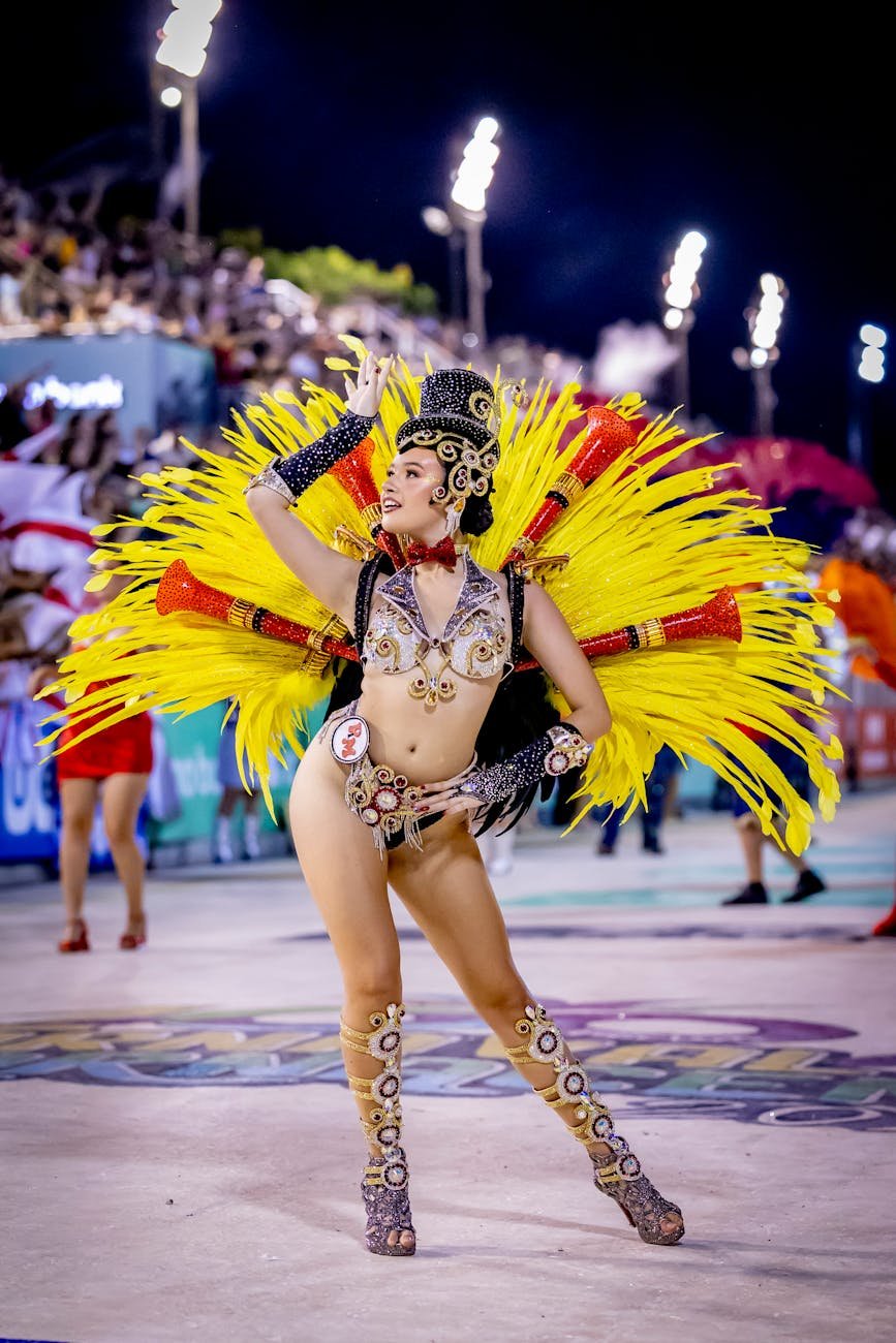 Colorful carnival dancer performing at night parade in Encarnación, Paraguay.